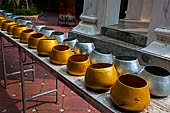 Thailand, Phra Pathom Chedi, the nation's largest pagoda in Nakorn Pathom. Bowls for the offerings. 